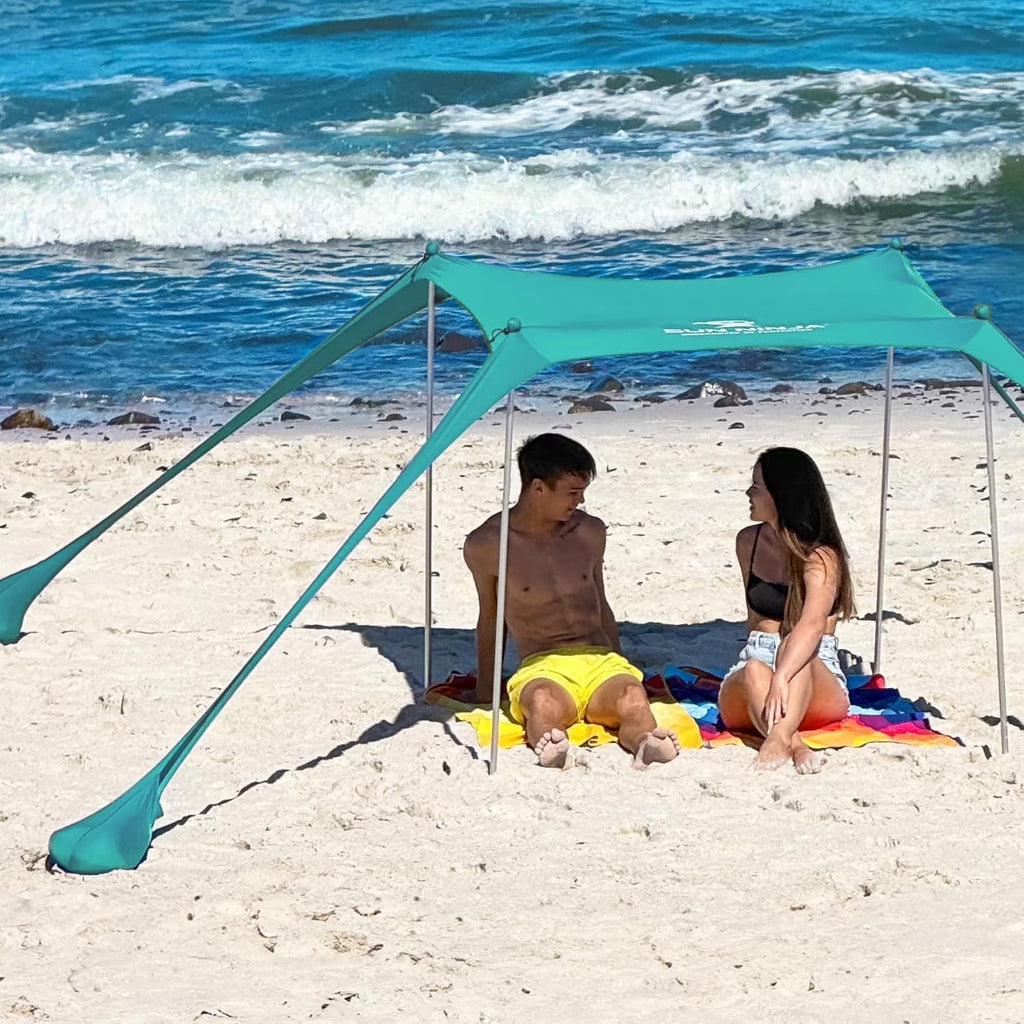 SUN NINJA 10x10.5 FT Pop-Up Beach Tent with Sand Shovel, Pegs & Stability Poles Navy Blue Sun Shelter for Beach, Camping & Outdoor Activities